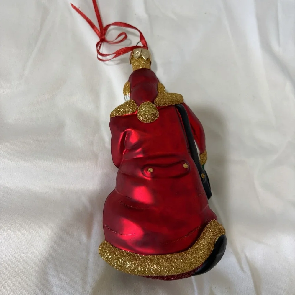 1999 Patricia Breen Through Rain and‎ Snow Santa Ornament Red Coat Bag Glass Vtg